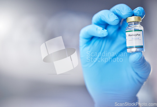 Image of Innovation, healthcare or hand with vaccine, medicine or product in bottle with a blurry or blurred background. Monkey pox, doctor or scientist working on medical cure or lab drugs in safety gloves