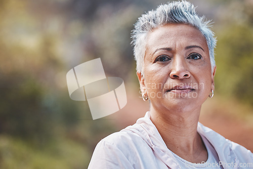 Image of Face portrait, fitness and senior woman in nature ready for workout, exercise or training. Sports, park and retired elderly female preparing for running, exercising or jog for health and wellness.