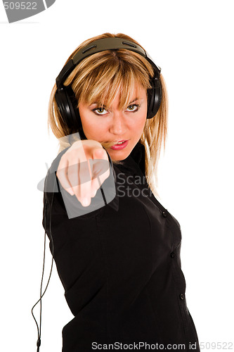 Image of woman listening music in headphones