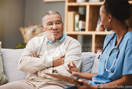 Image of Consulting, medical and checklist with old man and nurse for retirement, rehabilitation or physical therapy. Help, empathy and healing with patient and black woman in nursing home for healthcare exam