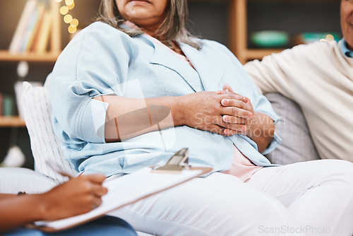 Image of Therapy, clipboard and senior couple on sofa for discussion, conversation and counseling with therapist. Marriage problem, psychology and hands of people with notes for relationship consultation