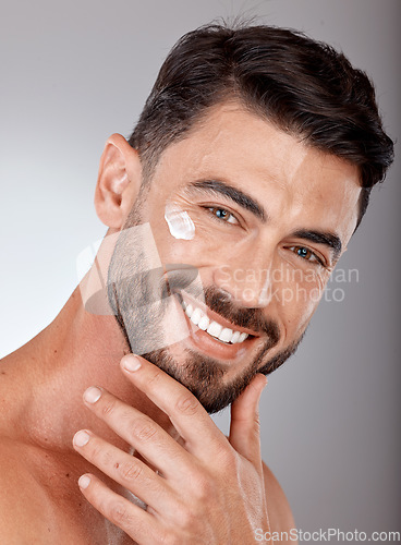 Image of Man, face and cream for skincare and beauty closeup with sunscreen, facial portrait and moisturizer. Lotion, skin wellness and glow with happy model, cosmetic care mockup against studio background