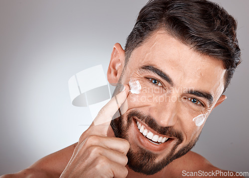 Image of Man, face and cream for skincare and beauty closeup with sunscreen, facial portrait and moisturizer. Lotion, skin wellness and glow with happy model, cosmetic care mockup against studio background
