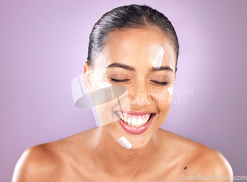 Image of Woman face, skincare and beauty cream for dermatology, health and wellness of natural glow skin on purple background. Headshot of happy cosmetic model laughing in studio with sunscreen product