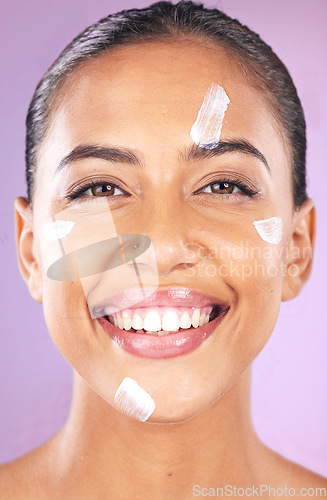 Image of Woman face, skincare and beauty cream with smile for dermatology, health and wellness of natural glow skin on purple background. Portrait of aesthetic cosmetic model in studio with sunscreen product