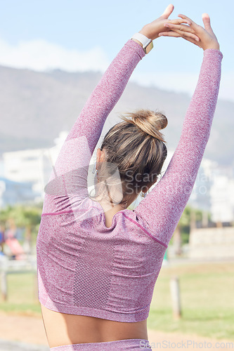 Image of Fitness, exercise and woman stretching outdoor in summer in a city for health, wellness and a healthy body. Back of a sports female or runner ready for cardio training, workout and morning routine