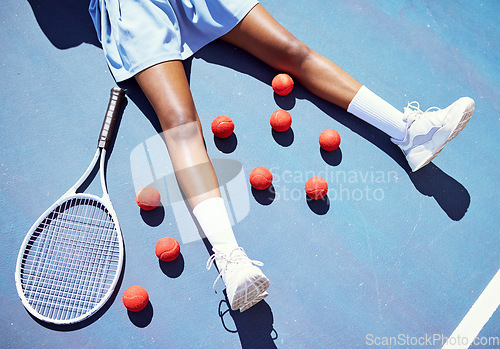 Image of Tennis, tired and woman on a court for sports, fitness training and professional game for cardio. Exercise, clothes and athlete losing sport competition, relax and freedom from outdoor workout