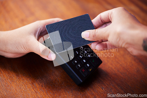 Image of Hands, credit card and shopping payment machine for digital finance tech, pos technology and retail market store banking. Cashier worker, customer hand and card checkout for nfc cashless purchase