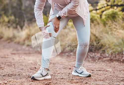 Image of Sports, knee pain and woman in park after running, exercise and marathon training for healthy lifestyle. Wellness, fitness and hands of female athlete with muscle strain, leg injury and accident