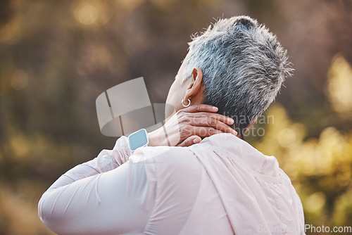 Image of Back, exercise and senior woman with neck pain, training or workout for wellness, outdoor or health. Mature female, athlete or injury in park, fitness or muscle massage for arthritis or joint tension