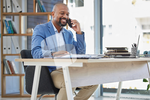 Image of Phone call, business and black man at office desk for corporate communication in company. Mature entrepreneur, mobile networking and talking on smartphone for sales deal, negotiation and ceo contact