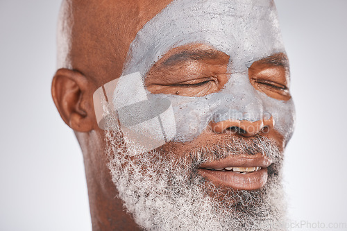 Image of Skincare, face mask or old man with facial cream marketing or advertising a luxury beauty product for self care. Studio background, cosmetics or senior black man with a happy smile, glow or self love