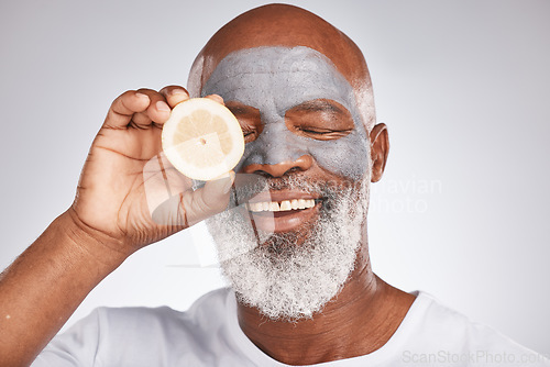 Image of Beauty, face mask or happy old man with lemon fruit marketing or advertising natural vegan diet for glowing skin. Cream, smile, senior black man with skincare or healthy facial grooming cosmetics