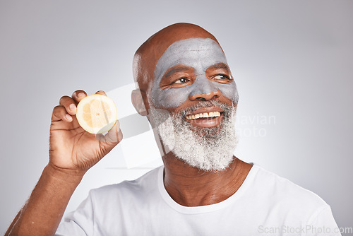 Image of Skincare, face mask or happy black man with lemon fruit marketing or advertising natural vegan diet for glowing skin. Cream, smile, African old man with beauty or healthy anti aging facial cosmetics
