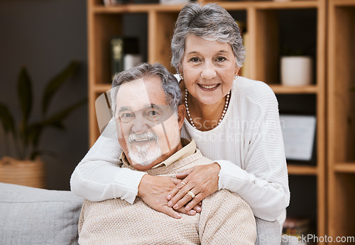 Image of Love, portrait or old couple hug in house living room enjoying quality bonding time in happy marriage commitment. Trust, support or elderly woman in romantic partnership with an old man in retirement