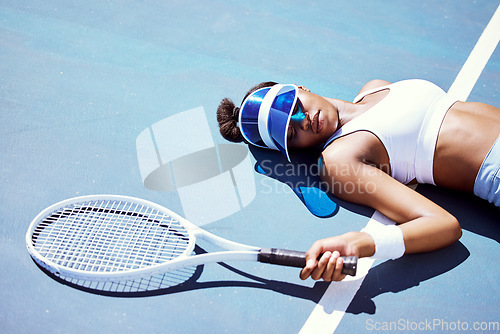 Image of Sports fatigue and tired tennis girl on ground in sun with athlete burnout at tournament practice. Athletic black woman exhausted at professional tennis court for competition and fitness training.