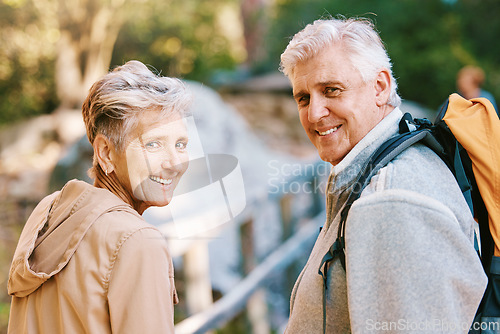 Image of Portrait, hiking or couple of senior friends in nature trekking, walking or hiking for peace or freedom. Travel adventure, partnership or happy elderly people enjoy fun bonding, fitness or exercise