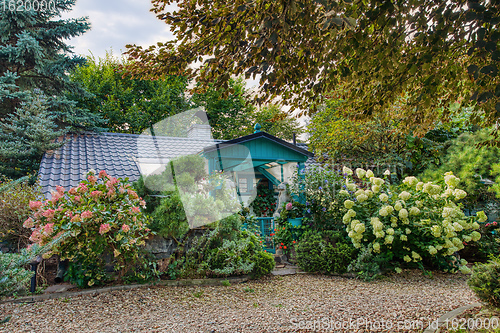 Image of building house in summer garden