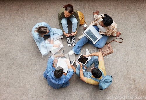 Image of Study, laptop and group of students on floor in project, research or planning, brainstorming and teamwork. Notebook, education and top of university student, friends or people collaboration in school