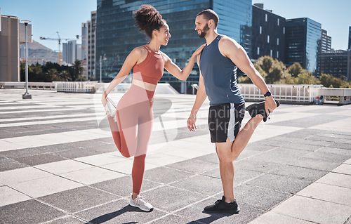 Image of Fitness, city and couple stretching legs for exercise, health or wellness. Sports runner, diversity or happy man and woman warm up, prepare or getting ready for training or running outdoors on street