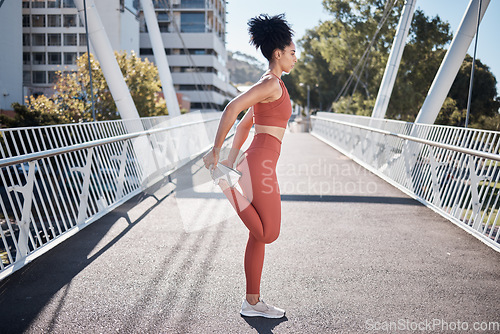 Image of City, stretching legs and body of woman in fitness exercise, runner workout or training in sports fashion on bridge. Warm up, focus and urban athlete in pilates motivation for muscle and health goals