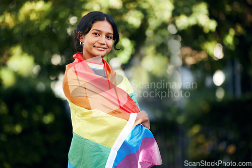 Image of Portrait, woman and rainbow flag for pride, support and lgbtq awareness, sexuality freedom and queer. Female, girl and they with equality, love and gender neutral lifestyle for activism and festival