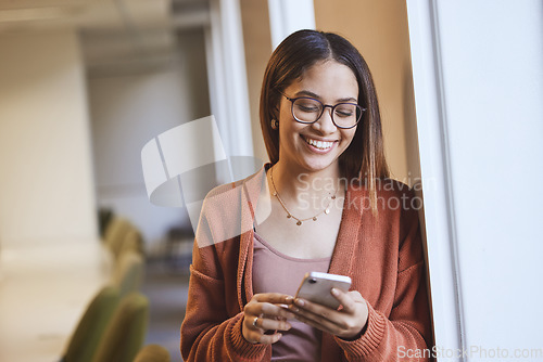 Image of Face, student and woman with phone in classroom for knowledge research or social media. Cellphone, university and happy female from Brazil with mobile smartphone for learning, studying and education.