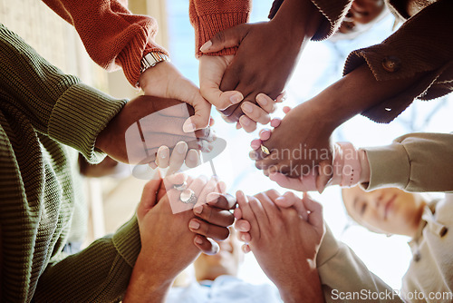 Image of Below, students and holding hands for support, motivation or education in campus community. Diversity, friends and motivation for learning with teamwork, studying or scholarship at college together