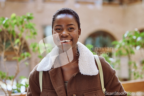 Image of Happy, smile and portrait of a black woman student standing outdoors at a university in South Africa. Happiness, excited and African female with a positive mindset at college for studying or learning