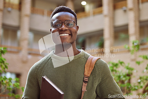 Image of University student, black man and portrait at campus for education, learning and studying in Atlanta. Happy young male college student with motivation for knowledge, scholarship opportunity and goals