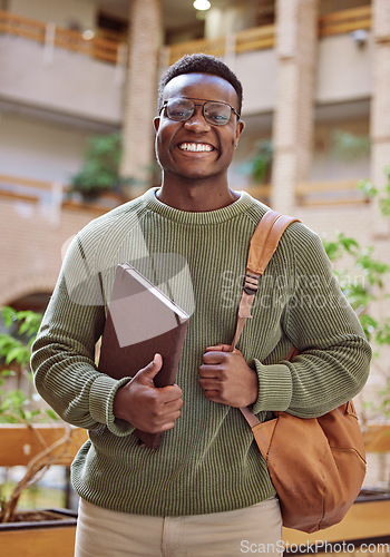 Image of Campus, student and portrait of black man at college building, academy and school for education in Atlanta. Happy university student studying with motivation for knowledge, learning or future success