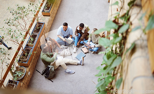 Image of College group, collaboration and diversity students working on research, university project or education study. Knowledge learning, scholarship teamwork and top view of relax people on school campus