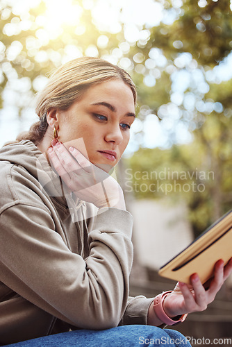 Image of Thinking woman, notebook or reading on college campus, university park or school in education, learning or study scholarship. Student, research book or diary journal for class schedule ideas or exams