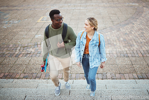 Image of University, students and friends with education and campus, study and discussion, walk and talk together with learning. Scholarship, college and studying, communication with black man and woman