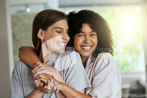 Image of Women, friends or bonding hug in house, home or hotel for girls vacation, holiday or luxury skincare spa. Portrait, smile or happy people in embrace for hospitality wellness, healthcare or self love