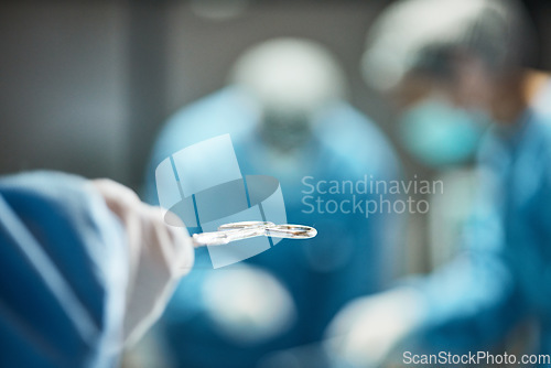 Image of Hospital tools, surgery and team of doctors in operating room for medical trust, innovation and support with healthcare insurance background. Metal scissors surgeon and nurse helping in a theater
