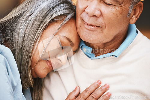 Image of Love, grief and elderly couple hugging with support, bonding and spending quality time together at home. Affection, loss and sad senior man and woman in retirement embracing with care at their house.