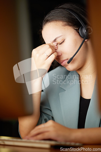 Image of Stress, headache and call center woman on computer telemarketing fail, anxiety or burnout in global, virtual customer support. Tired, fatigue financial advisor or consultant frustrated, sad or angry