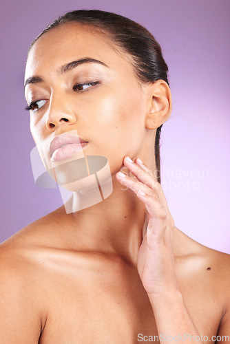 Image of Skincare, beauty glow and woman thinking of makeup, advertising cosmetics and body wellness on a purple studio background. Spa, dermatology and cosmetic model marketing facial cosmetology treatment