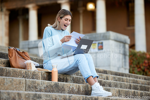 Image of Wow, success or happy student with news, results or report feedback at university or college campus steps. Laptop, education or excited school girl reading exam paper marks or test score with pride