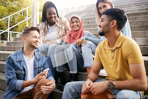 Image of Relax, diversity or students on steps at break talking or speaking of goals, education or future plan. Group, school or happy friends in university or college bonding in a fun social conversation