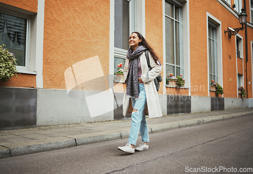 Image of Happy, relax and woman in the city street for travel adventure, walking and thinking on a vacation in Italy. Peace, idea and traveler girl in a vintage road traveling a town during a holiday