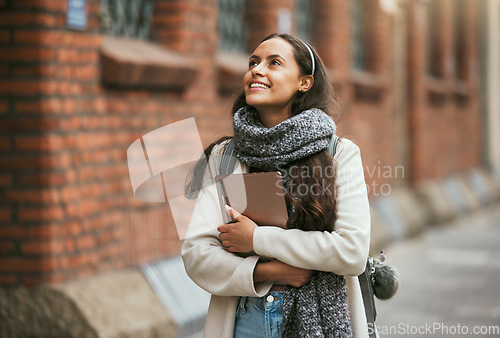 Image of Travel, city and student walking with tablet on outdoor adventure in sidewalk street, road or journey In Chicago USA. Urban architecture buildings, opportunity or happy woman smile on winter vacation