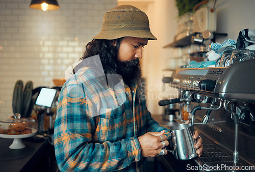 Image of Cafe worker, coffee shop barista and man work on espresso machine in a restaurant. Waiter, milk foam and breakfast latte of a person from Brazil working on job, food order and service with focus