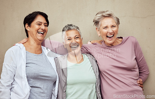 Image of Senior women, group and laughing for fitness, workout or happiness of healthy lifestyle together. Mature female friends relax after training, wellness and funny retirement exercise on wall background