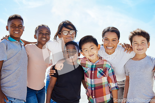 Image of Family, adoption and kids portrait on beach with mom enjoying USA summer vacation in the sun. Foster, interracial and happy family hug together with smile on vacation break in nature.