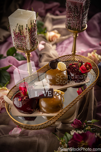 Image of Still life of heart shaped mousse cakes