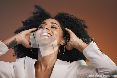 Image of Hair care, beauty and black woman with makeup, hair and happy with afro and cosmetic care, face and skincare. Hairstyle with facial, natural curly hair texture and pride against studio background