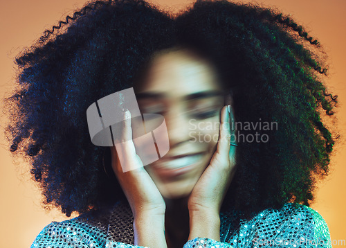 Image of Face blur, hair care and beauty with black woman and movement with makeup and cosmetic care against studio background. Hair, cosmetics with hands and facial, wellness with afro and natural curly hair