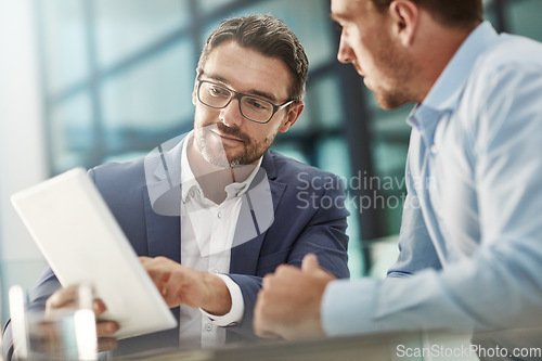 Image of Tablet, teamwork and meeting of business people in office discussion. Collaboration, technology and men or employees with touchscreen planning sales, marketing or advertising strategy in company.
